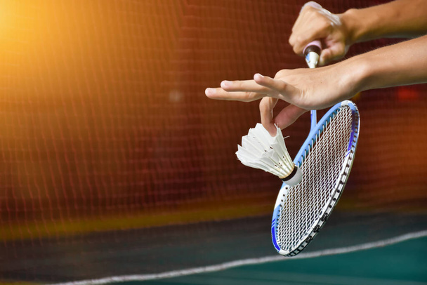 stock-photo-badminton-racket-old-white-shuttlecock